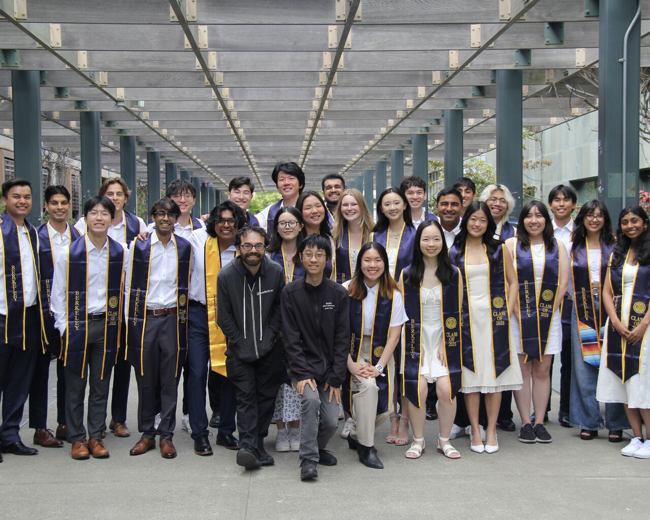 A second photograph celebrating graduation from Berkeley.